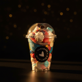 Tall large sweet cup overflowing with sweets